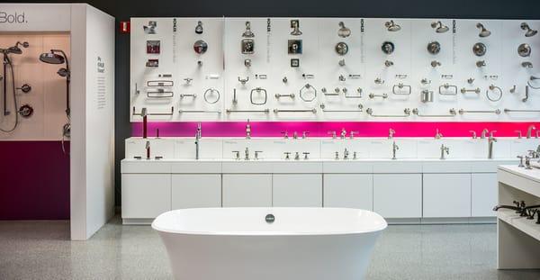 Faucets, bathtubs, and showers on display at our Kitchen and Bathroom store.