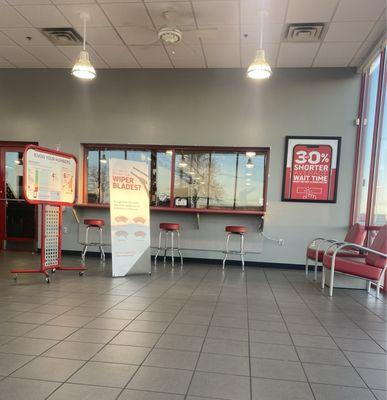 Waiting area with windows into the shop