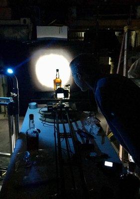 Behind the scenes shot of a product video for a whiskey company