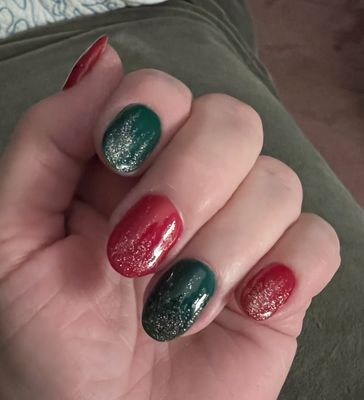 Beautiful job on my Christmas nails by Kim.