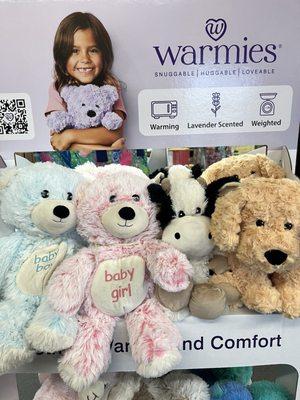 These plush Warmies come in teddy bears, unicorns, dinosaurs, dogs, cats, and other cuddly animals.