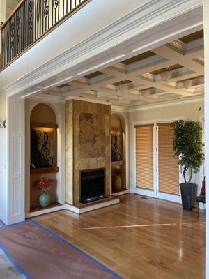 Elegant carpentry work adding accented to columns walls and ceilings.