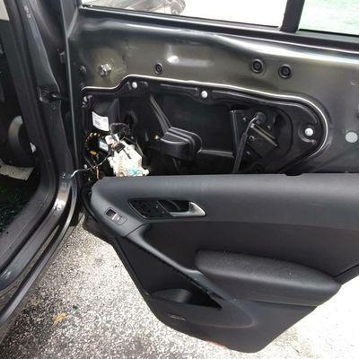 We make sure to safely remove the door panel.