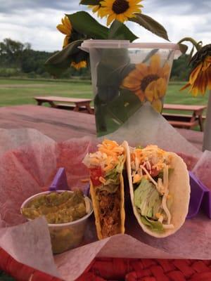 One hard taco with beef, one soft taco with chicken.  side of guac.