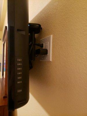 Outlet behind TV