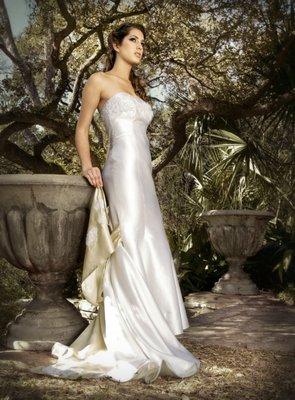 Luxury silk & cotton fabric emits glorious light from this original wedding gown.