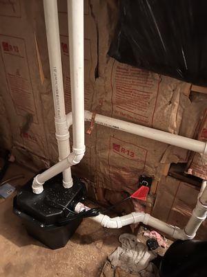 Sump pump we installed in a basement kitchen.