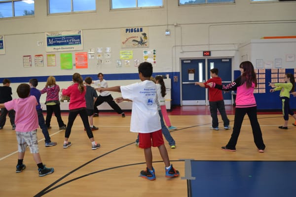 Students learning about Kung Fu in their P.E. class!