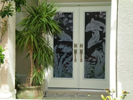 glass etching Dolphins and fish on glass door inserts on double front entry fiberglass doors