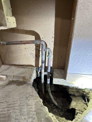 Here are the exposed pipes after breaking the slab and seeing the leak