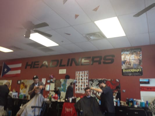 Headliners inside the shop with the best barbers in town doing what they do best