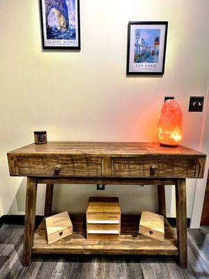 Beautiful wooden desk with salt lamp inside The Hippie Gypsy RN where you can purchase Doterra essential oils!