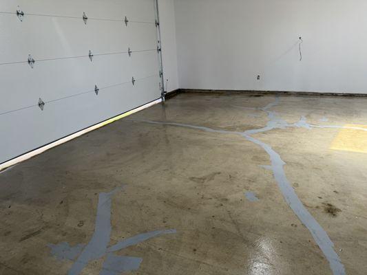 Primed and patched floor getting it ready for epoxy