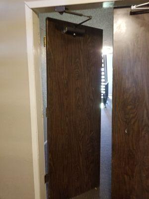 Fire doors hanging off the hinges.