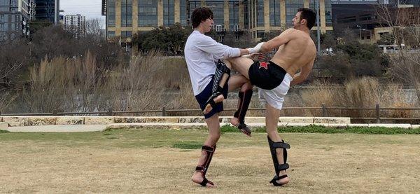 Sparring with student Jack. Sparring is only for those who wish to spar.