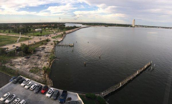 Dystopian shoreline and collapsing pier.