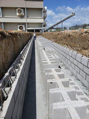 Commercial egg ranch walls going in at job site. First block lift built.