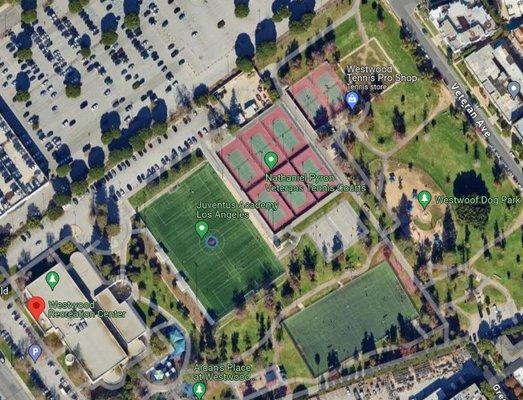 We are located at the Westwood Tennis Center on the 2 lower tennis courts, on the top middle of this picture & closest to Veteran Avenue.