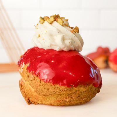 Le Chou de L'ètè- This summer dessert has a pâte a choux base with sweet craquelin, filled with strawberry mousse and pistachio paste.