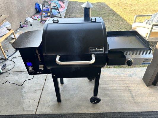 Camp Chef pellet smoker with the sidekick attachment i bought for my oldest sons 33rd Bday he LOVES!! He needs to clean his yard Lol!