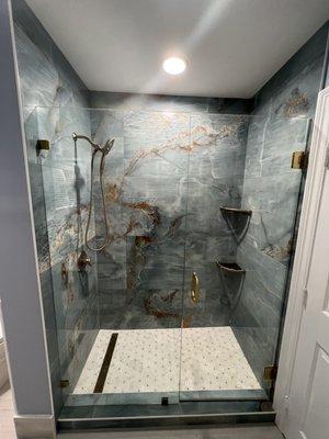 Standing shower bathroom.