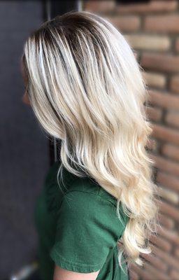 Platinum blonde with root shadow