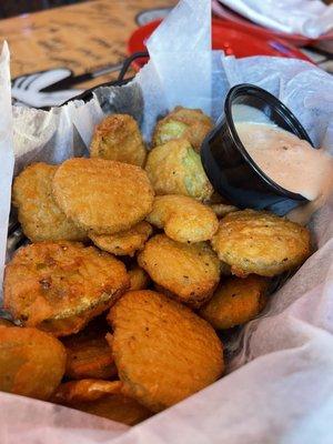 "Frickles,"   ie, fried pickles, or maybe, Frick's pickles, or maybe, Fricker's pickles, or maybe...