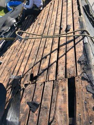 Condition of underlayment when roof was stripped. An overlay of sheathing was installed to correctly install the new roof.