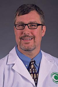 Gregory A. Holmes, MD